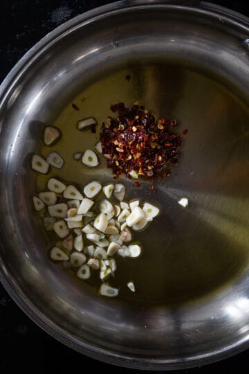 saute garlic and chili flakes into olive oil